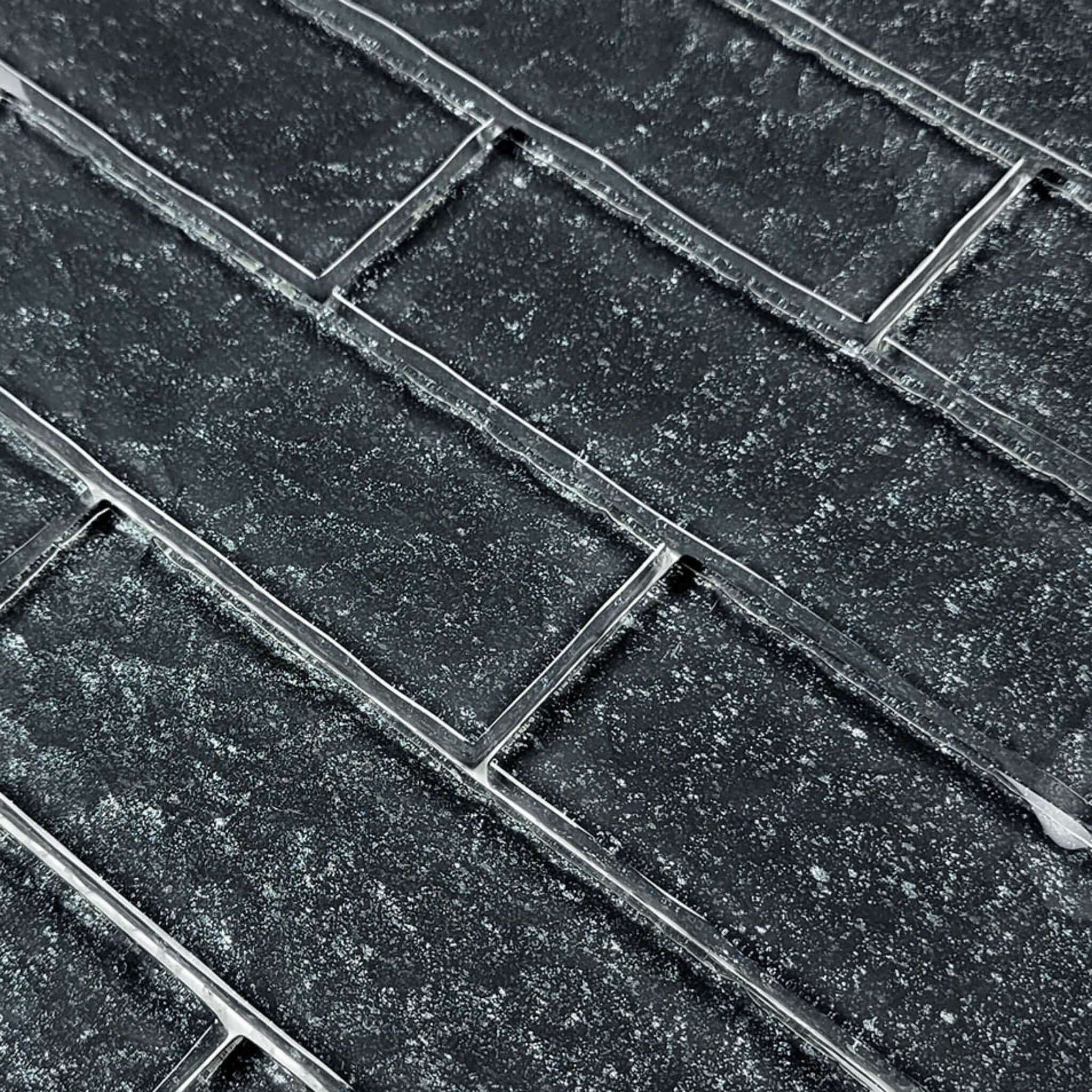 Close-up of Artistry in Mosaics 2" x 6" Black Glass Tiles from Moonscape Series. SKU MS826K1 at Discount Pool Mart DPM.