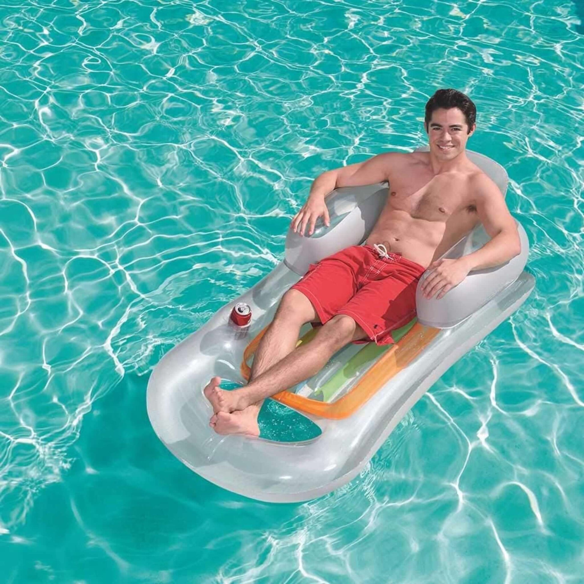 H2O GO Designer Fashion Lounge inflatable pool float with man relaxing in water, SKU 43028E from Discount Pool Mart DPM.
