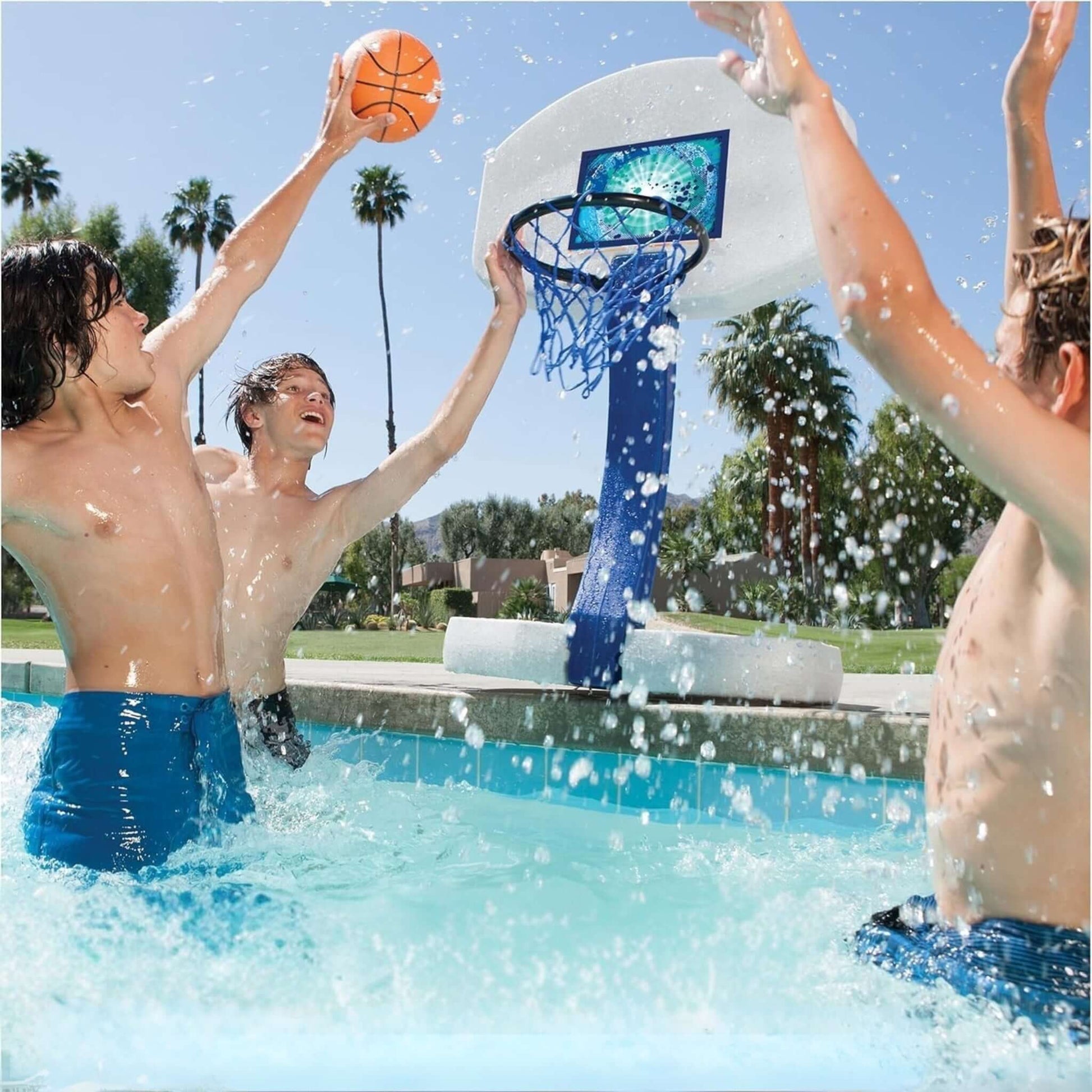 Three kids playing basketball in a pool with the SwimWays 2-in-1 Sport Combo Set, SKU 6042387, from Discount Pool Mart DPM.