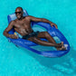 Man relaxing on a SwimWays Spring Float Recliner XL in a pool, SKU 6069706, available at Discount Pool Mart DPM.