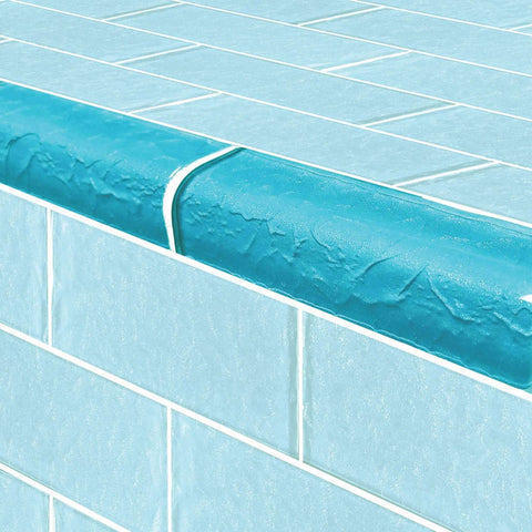 Close-up of Artistry in Mosaics 2" x 6" Glass Tiles Turquoise Trim for pool edges, SKU TRIM-MS826T3, by Discount Pool Mart DPM.