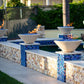 The Outdoor Plus Cazo Fire Bowl GFRC Concrete by Discount Pool Mart DPM, Spanish-style design fire features for outdoor spaces.