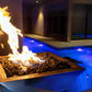 Maya Fire & Water Bowl by The Outdoor Plus, Hammered Patina Copper, SKU DPM, elegant flames near a pool.