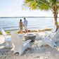 Couple enjoying the beach view with TenJam Woosah chairs, perfect for poolside relaxation. SKU: DPM-001