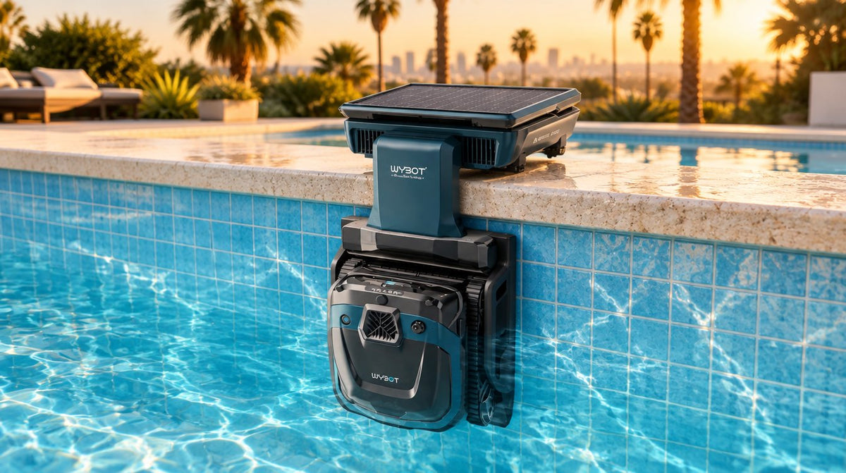 Wybot S3 solar robotic pool cleaner docked on its charging station at the edge of a Los Angeles pool