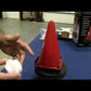 Poolguard Safety Buoy alarm installation, showcasing red cone and components on a table, available at Discount Pool Mart DPM.