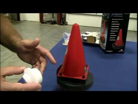 Poolguard Safety Buoy alarm installation, showcasing red cone and components on a table, available at Discount Pool Mart DPM.