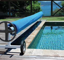 The Benefits of Pool Covers: Savings, Conservation, and Cleanliness